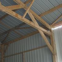 hangar agricole en bois avec bardage et couverture en bac acier